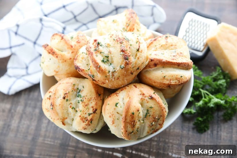 Garlic Parmesan Pull-Apart Dinner Rolls 3 These easy Garlic Parmesan Rolls have layers of flavor to pull apart and savor in every bite. The perfect dinner rolls for holidays or any meal. You'll love these shortcut butterflake rolls.