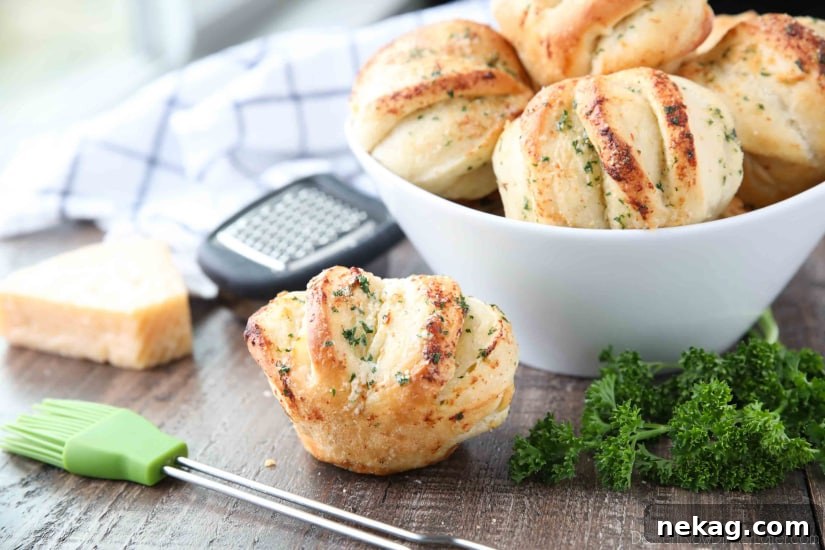 Garlic Parmesan Pull-Apart Dinner Rolls 7 These easy Garlic Parmesan Rolls have layers of flavor to pull apart and savor in every bite. The perfect dinner rolls for holidays or any meal. You'll love these shortcut butterflake rolls.