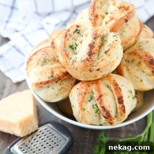 Garlic Parmesan Pull-Apart Dinner Rolls 8 These easy Garlic Parmesan Rolls have layers of flavor to pull apart and savor in every bite. The perfect dinner rolls for holidays or any meal. You'll love these shortcut butterflake rolls.