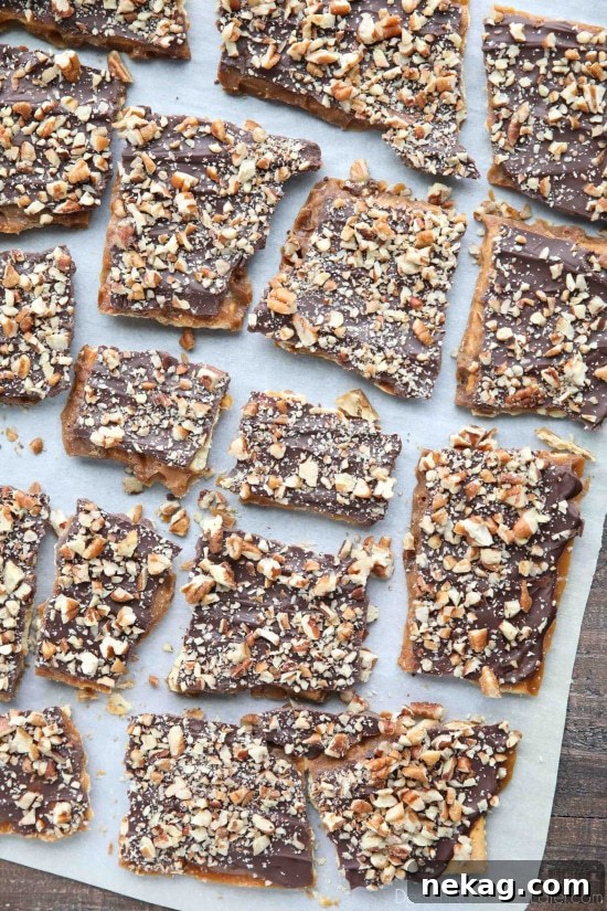 Cracker Toffee (aka Christmas Crack) is so easy to make and highly addictive! Saltine crackers are coated in a quick toffee layer and topped with chocolate and nuts.