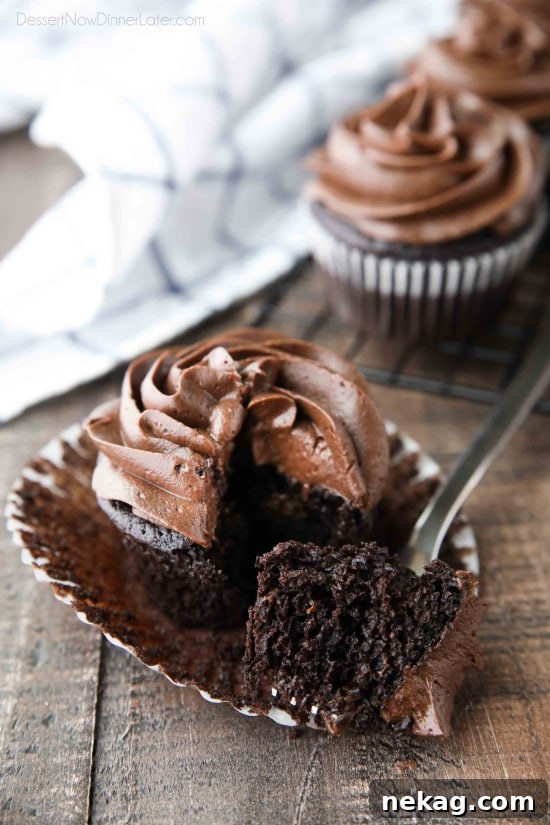 Chocolate Cupcakes Recipe with Step-by-Step Video Tutorial 4 A fork full of chocolate cupcake.