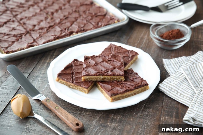 Chewy No-Bake Peanut Butter Bars Recipe 5 These Peanut Butter Bars with oatmeal are a soft and chewy baked cookie dessert topped with an extra layer of peanut butter, and a decadent chocolate frosting. Perfect for parties and potlucks! (Serves a crowd.)