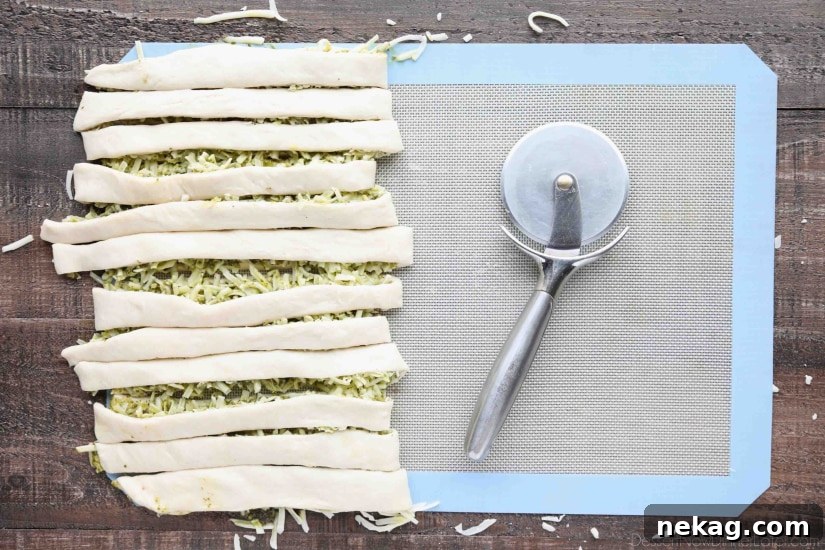 Crispy Pesto Breadsticks Recipe for Garlic-Parmesan Dipping 8 Pesto Breadsticks stuffed with basil pesto and mozzarella.