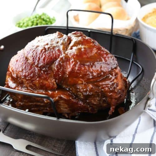 Brown Sugar Mustard Glazed Ham is super easy to make with only a few common ingredients for a thick, sticky glaze. No pre-cooking the glaze. Just mix, slather, and bake. It's the easiest holiday ham!