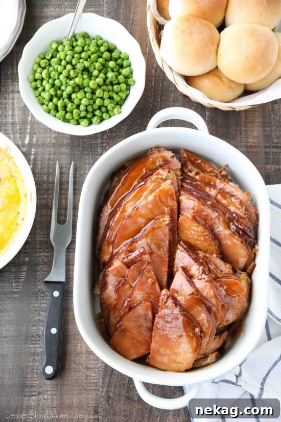 Brown Sugar Mustard Glazed Ham is super easy to make with only a few common ingredients for a thick, sticky glaze. No pre-cooking the glaze. Just mix, slather, and bake. It's the easiest holiday ham!