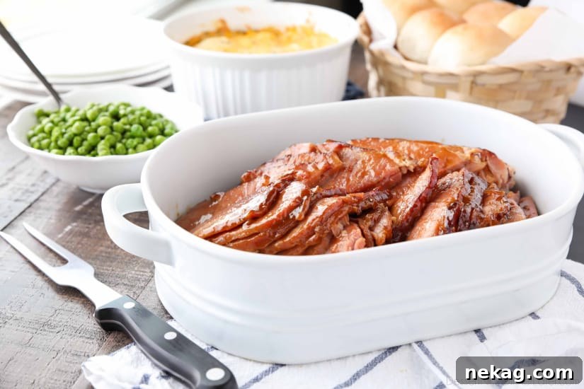 Brown Sugar Mustard Glazed Ham is super easy to make with only a few common ingredients for a thick, sticky glaze. No pre-cooking the glaze. Just mix, slather, and bake. It's the easiest holiday ham!