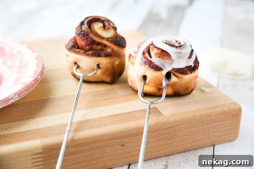 Campfire Cinnamon Rolls are cooked on a stick over a fire or grill. As easy as a can of biscuits, but with real yeast dough instead! The best cinnamon rolls you will ever have while camping!