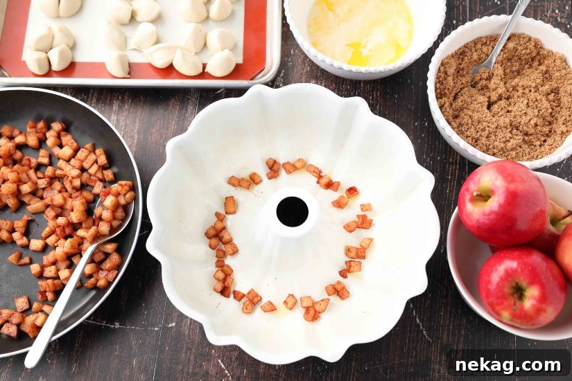 Apple Fritter Monkey Bread - Use a bundt pan and start with a layer of caramelized apple pieces.