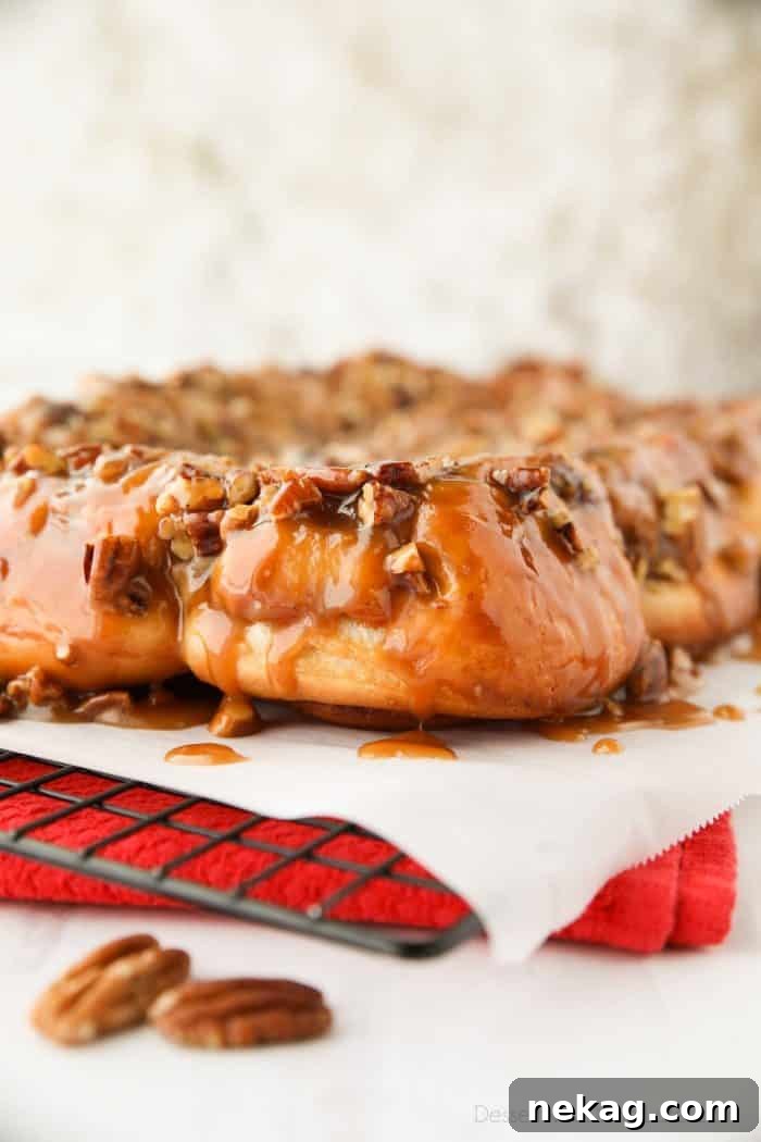 Caramel Pecan Rolls Recipe with Video Tutorial 6 These easy caramel pecan rolls are so sticky, gooey, and delicious. They're made with frozen cinnamon rolls so half the work is done for you! Perfect for holidays or weekends.