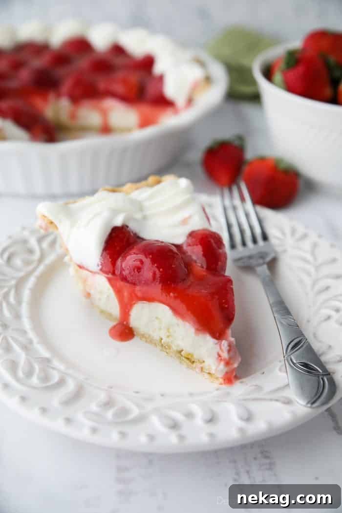 Strawberry Cream Pie is light, fruity, and delicious. With layers of pie crust, no-bake cheesecake, and slices of fresh strawberries smothered in a sweet glaze. A perfect dessert for Valentine's Day or summer potlucks.