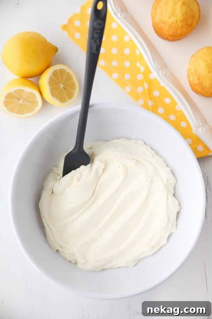 Lemon Cream Cheese Frosting is light and creamy with fresh lemon flavor. It's slightly tangy and not overly sweet. Perfect for piping or decorating cupcakes and cakes.