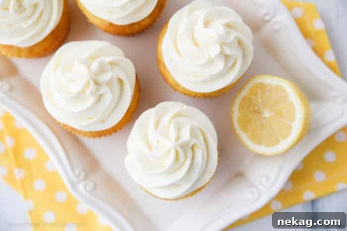 Lemon Cream Cheese Frosting is light and creamy with fresh lemon flavor. It's slightly tangy and not overly sweet. Perfect for piping or decorating cupcakes and cakes.
