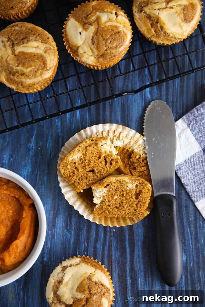 Pumpkin Cream Cheese Muffins Recipe with Video Tutorial 3 Pumpkin Cream Cheese Muffins are full of fall spices and a dollop of cream cheese filling swirled on top.