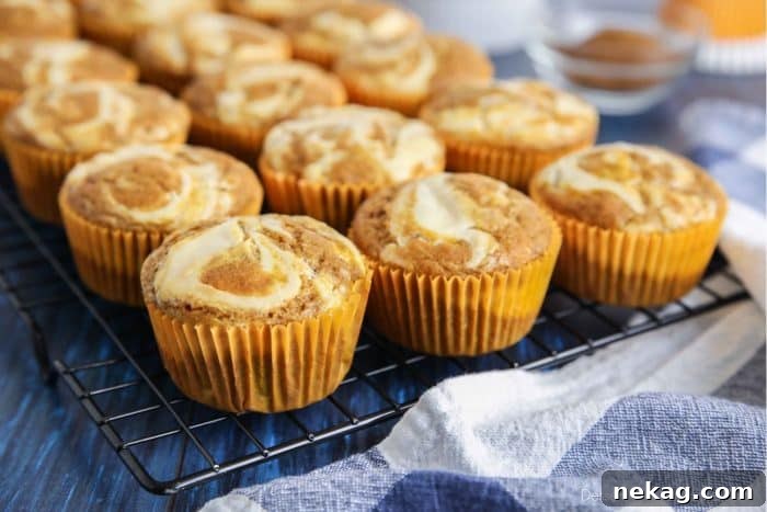 Pumpkin Cream Cheese Muffins Recipe with Video Tutorial 7 Pumpkin cream cheese muffins are light, fluffy, and moist, full of pumpkin spice flavor, and swirled with creamy cheesecake.