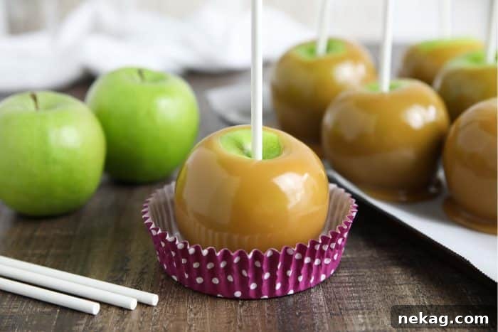 Classic homemade caramel apples are fun to make from scratch. Any leftover caramel can be cooled, cut, and wrapped for treats.