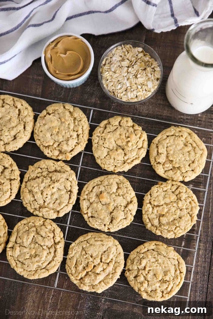 Peanut butter oatmeal cookies cooling on wire rack.