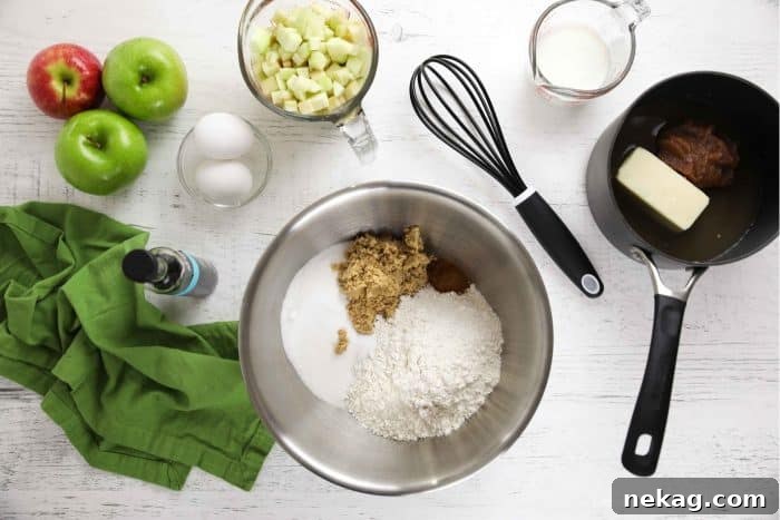 Brown Sugar Glazed Apple Sheet Cake Recipe 6 Apple sheet cake ingredients: flour, baking soda, salt, sugar, brown sugar, cinnamon, butter, apple butter, water, buttermilk, eggs, vanilla, and diced apple.