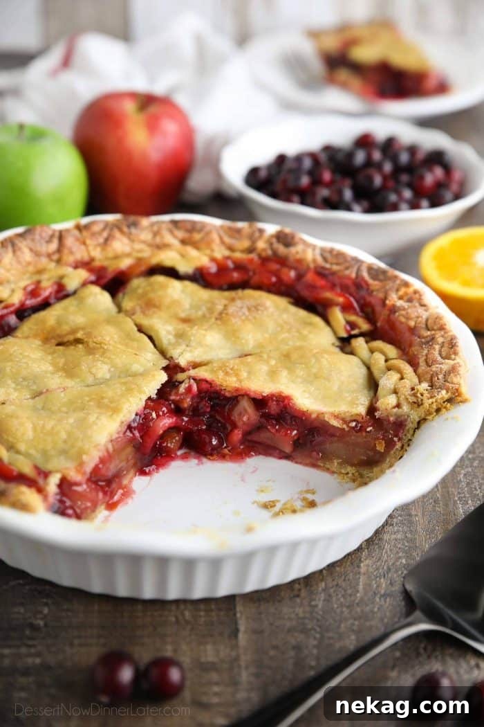 Cranberry Apple Pie Recipe: Tart-Sweet Holiday Dessert 4 Close up of filling on apple and cranberry pie.
