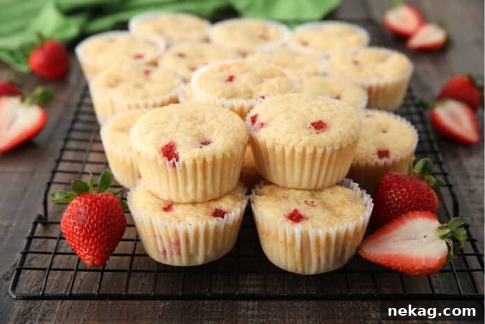 Fresh Strawberry Cupcakes with Real Fruit Frosting 7 Fresh strawberry cupcakes have a fluffy vanilla cake with chunks of real strawberries.