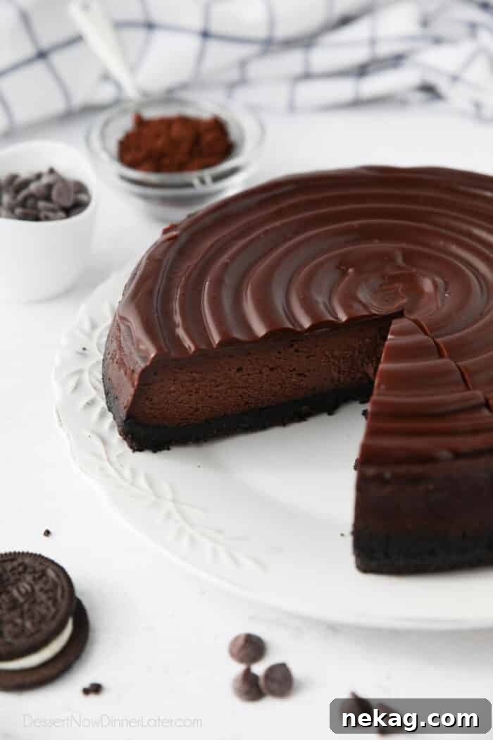 Triple Chocolate Cheesecake with slices taken out.