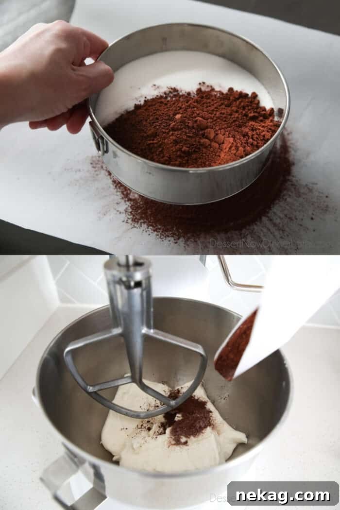 Sifting sugar, cocoa powder, and salt onto parchment paper. Then lifting the parchment paper and pouring ingredients into mixer.