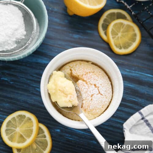 Light and Luscious Lemon Pudding Cake Recipe 10 Spoonful of lemon pudding cake in ramekin.