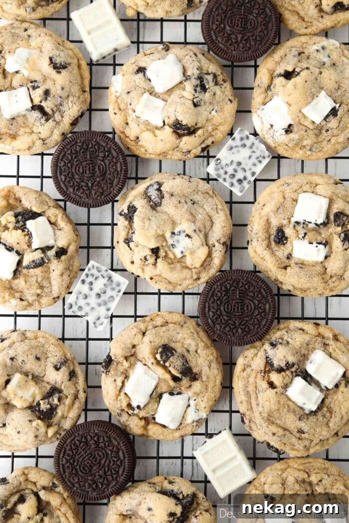 Cookies & Cream Sandwich Cookies: Homemade Oreo-Style Recipe 3 Cooling rack with baked cookies, Oreos, and cookies & cream candy bars.