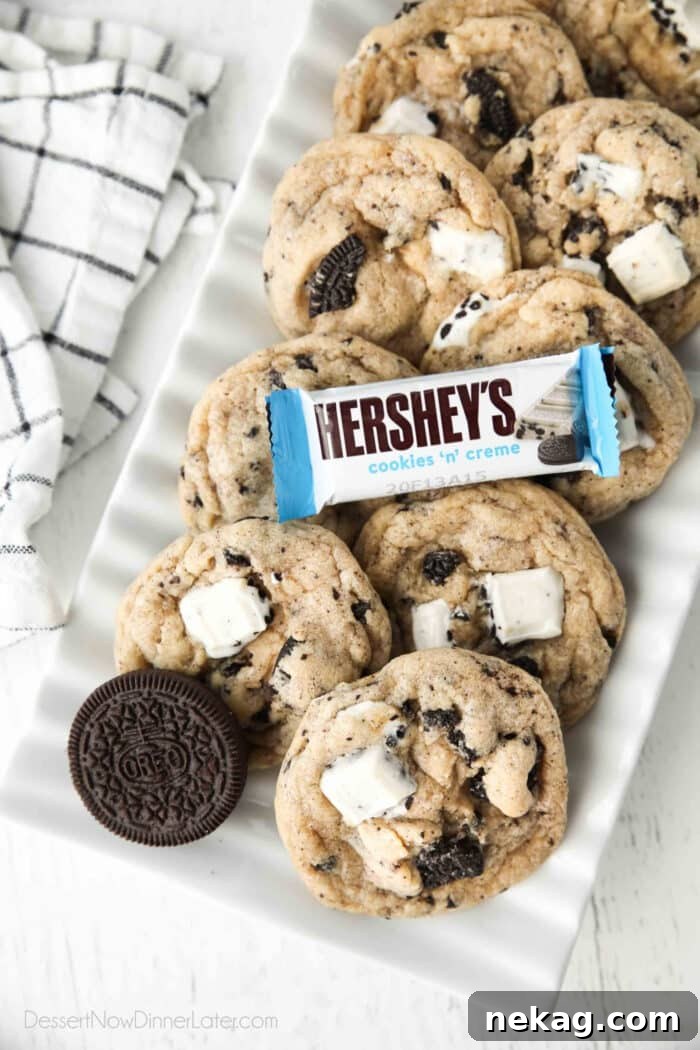 Cookies & Cream Sandwich Cookies: Homemade Oreo-Style Recipe 6 Plate of cookies and cream cookies with an Oreo and Hershey's Cookies 'n' Creme candy bar.