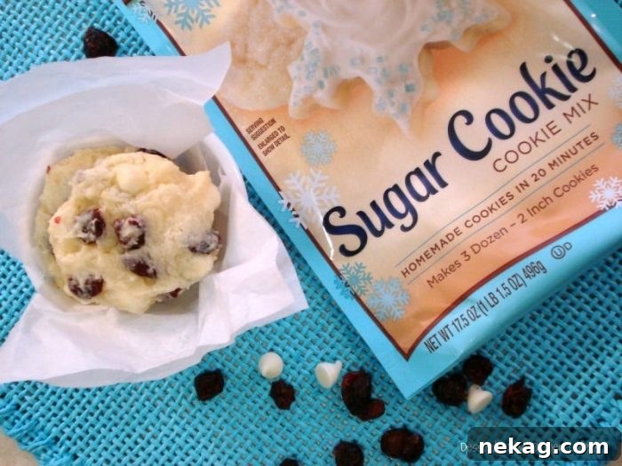 Cranberry Cream Cheese White Chocolate Chip Cookies are easily made with a sugar cookie mix, for a unique holiday cookie!