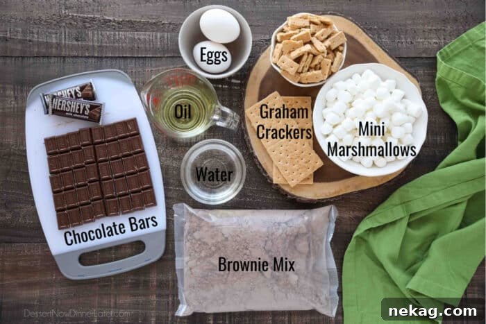 S'mores Brownies Recipe: Gooey Chocolate Graham Bar Squares 5 Ingredients for S'mores Brownies: Brownie Mix, Eggs, Oil, Water, Chocolate Bars, Graham Crackers, and Mini Marshmallows.