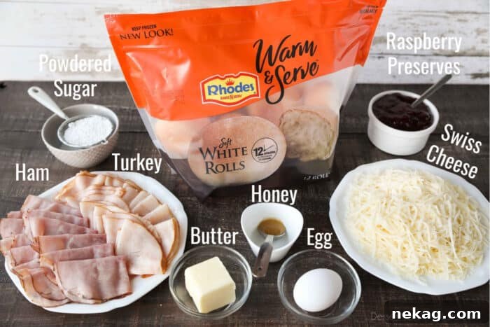 Crispy Monte Cristo Sliders with Ham, Turkey & Melty Cheese 5 Ingredients for Monte Cristo Sliders: dinner rolls, ham, turkey, Swiss cheese, raspberry preserves, butter, honey, egg, and powdered sugar.