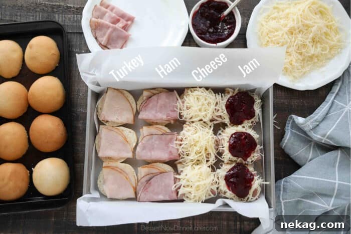 Crispy Monte Cristo Sliders with Ham, Turkey & Melty Cheese 6 Assembling Monte Cristo Sliders: Cut rolls in half. Place bottom half in a prepared baking dish. Layer turkey, ham, cheese, and jam.