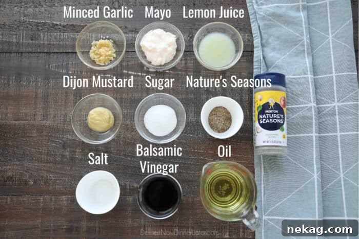 Creamy Balsamic Dressing Ingredients: Minced Garlic, Mayonnaise, Lemon Juice, Dijon Mustard, Sugar, Morton Nature's Seasons, Salt, Balsamic Vinegar, and Oil.