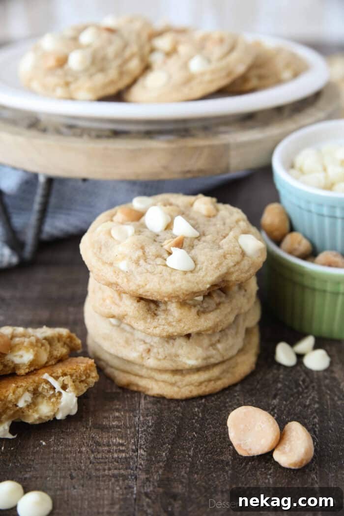 White Chocolate Macadamia Nut Cookie Recipe for Chewy Crispy Cookies 3 Stack of White Chocolate Macadamia Cookies.