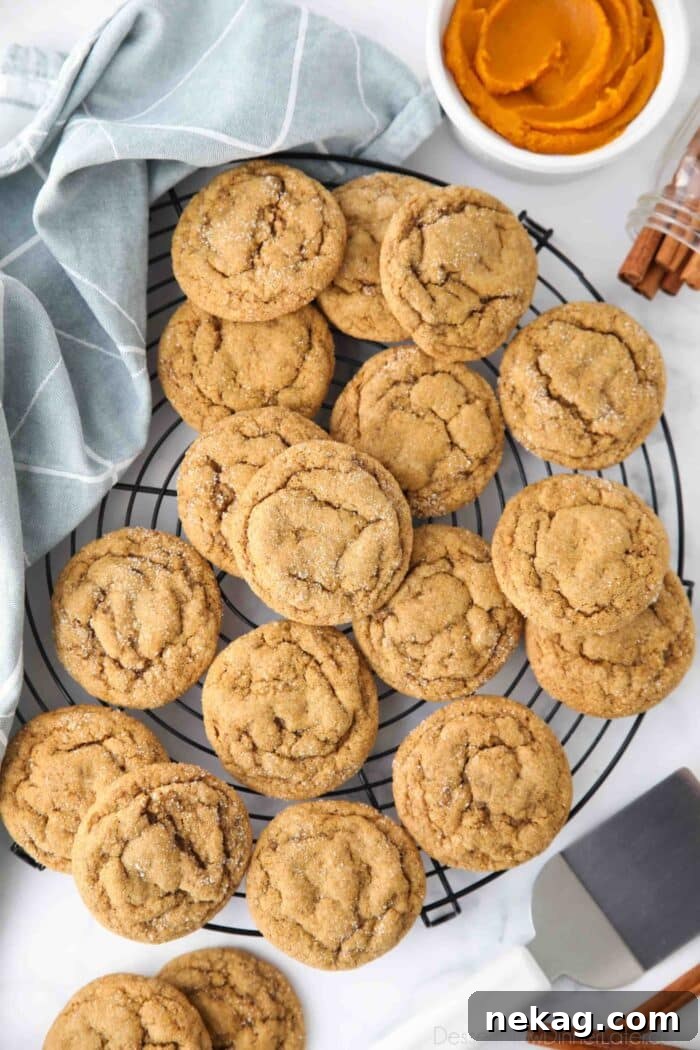 Chewy Pumpkin Gingersnap Cookies with Warm Spices 3 Cooling rack full of pumpkin gingersnap cookies.