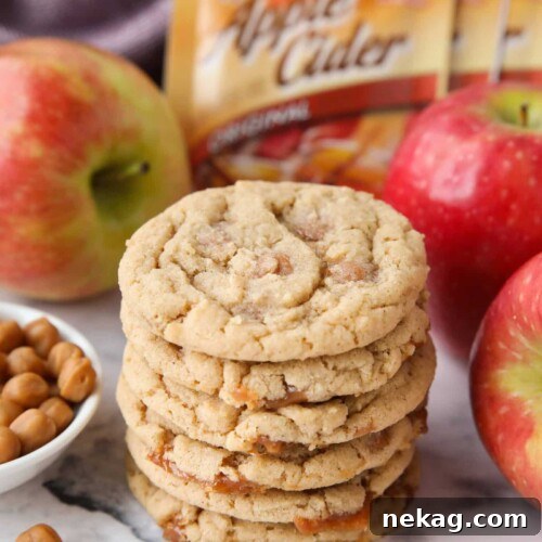 Caramel Apple Cider Cookies Recipe for Cozy Fall Baking 10 Stack of caramel apple cider cookies made with apple cider mix and caramel bits.