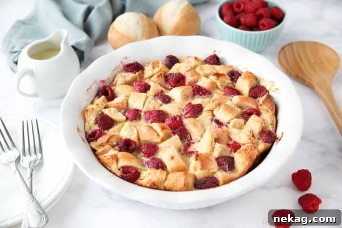 Creamy Raspberry Bread Pudding Recipe with Vanilla Sauce 8 Baked Raspberry Bread Pudding in a round baking dish.