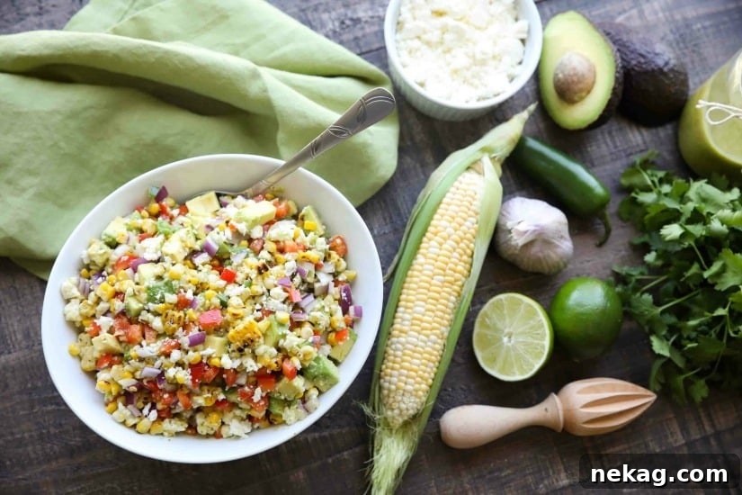 This summer Corn Salad with Queso Fresco is loaded with grilled corn, crisp onions and peppers, and creamy avocado, all topped with a homemade cilantro lime vinaigrette and generous helping of delicious queso fresco.
