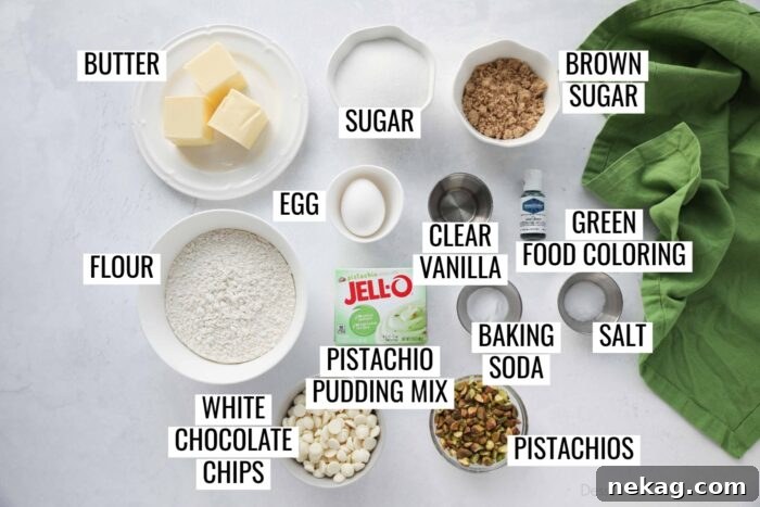 Ingredients for Pistachio Pudding Cookies: butter, granulated sugar, brown sugar, egg, vanilla, green food coloring, flour, pistachio pudding mix, baking soda, salt, white chocolate chips, and pistachios.