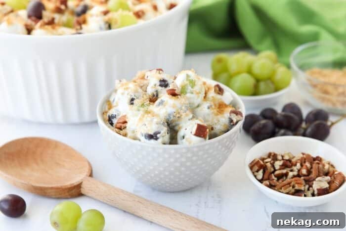 Creamy Grape Salad Recipe with Crunchy Pecans and Sweet Dressing 7 Individual serving of creamy grape salad in a bowl.