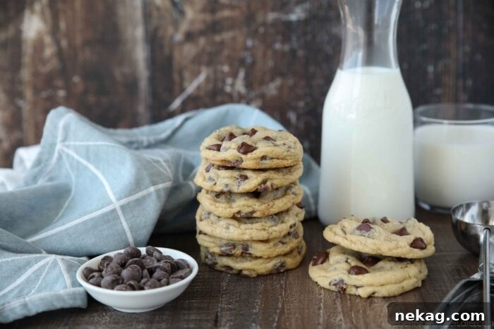 Stack of chocolate chip cookies and a glass of milk.
