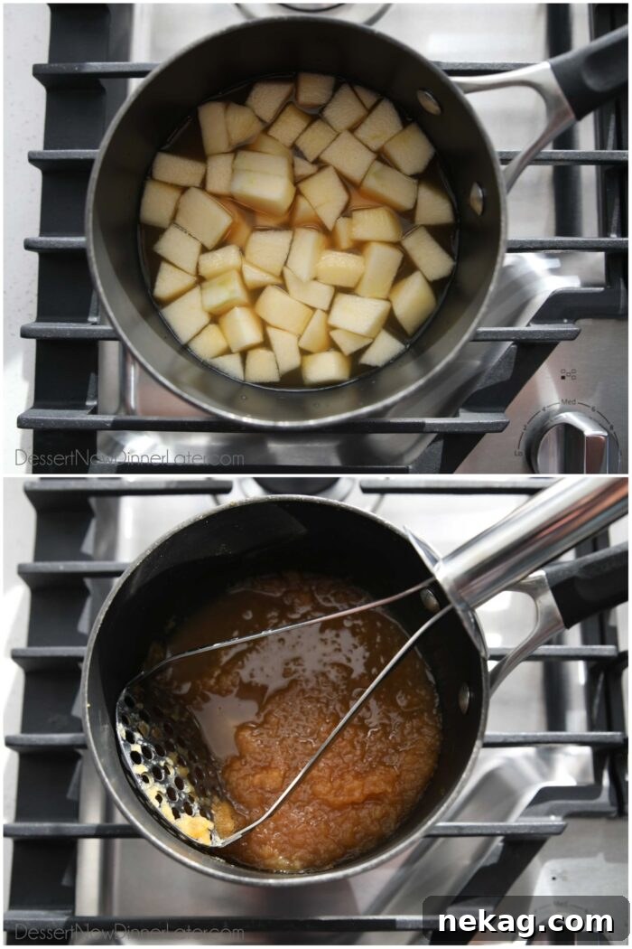 Apple Cider Donut Cake Recipe with How-To Video 6 Apple slices and apple cider in a saucepan being cooked and mashed.