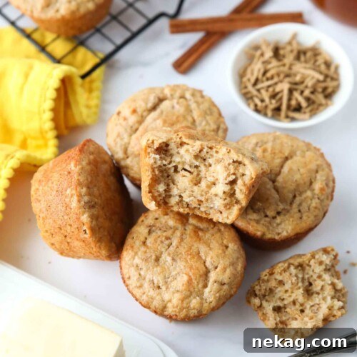 Muffins made with All-Bran cereal, with one muffin showing the light and fluffy interior texture.