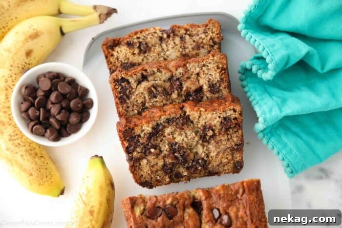 Chocolate Chip Banana Bread Recipe with Melted Chocolate Chunks 7 Slices of banana bread with chocolate chips inside.