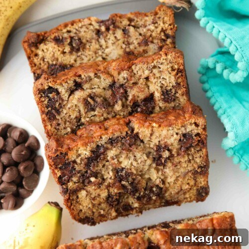 Chocolate Chip Banana Bread Recipe with Melted Chocolate Chunks 8 Slices of banana bread with chocolate chips inside.