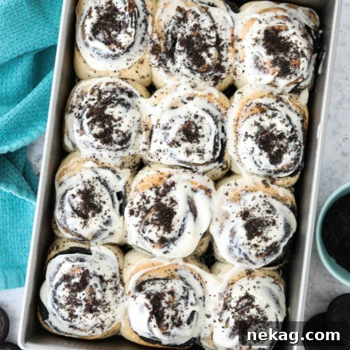 Oreo-Stuffed Cinnamon Rolls with Cream Cheese Glaze 12 Pan of frosted Oreo cinnamon rolls with cream cheese frosting.