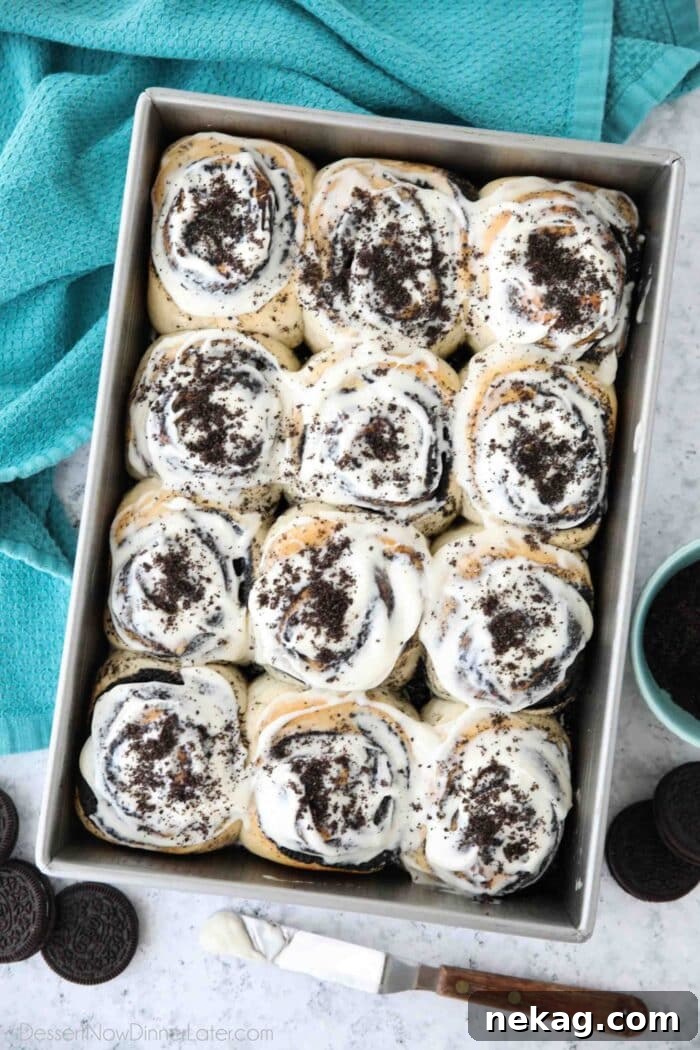 Oreo-Stuffed Cinnamon Rolls with Cream Cheese Glaze 3 Pan of frosted Oreo cinnamon rolls with cream cheese frosting.