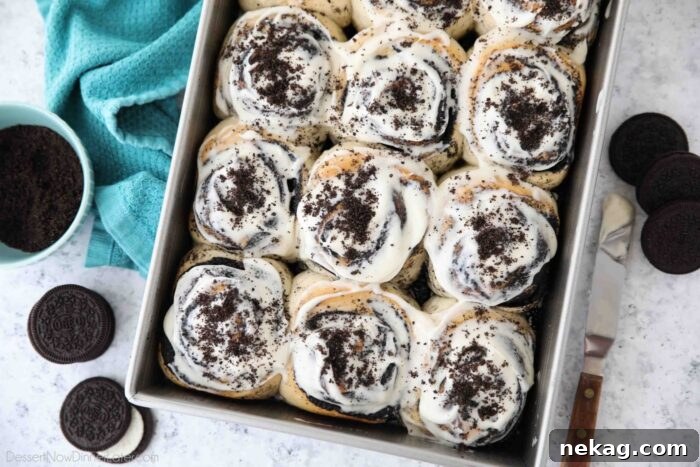 Oreo-Stuffed Cinnamon Rolls with Cream Cheese Glaze 10 Pan of frosted Oreo cinnamon rolls with cream cheese frosting.