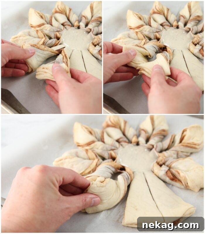 Process of twisting two strips of dough together to form points of the star bread.