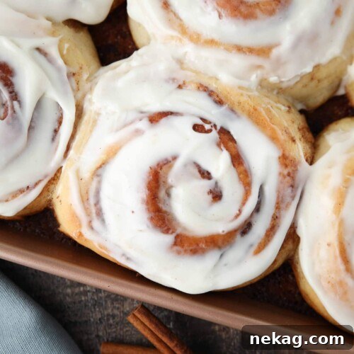 Homemade Cinnamon Rolls with Gooey Cream Cheese Frosting 14 Close-up of the best cinnamon rolls with cream cheese frosting in pan.